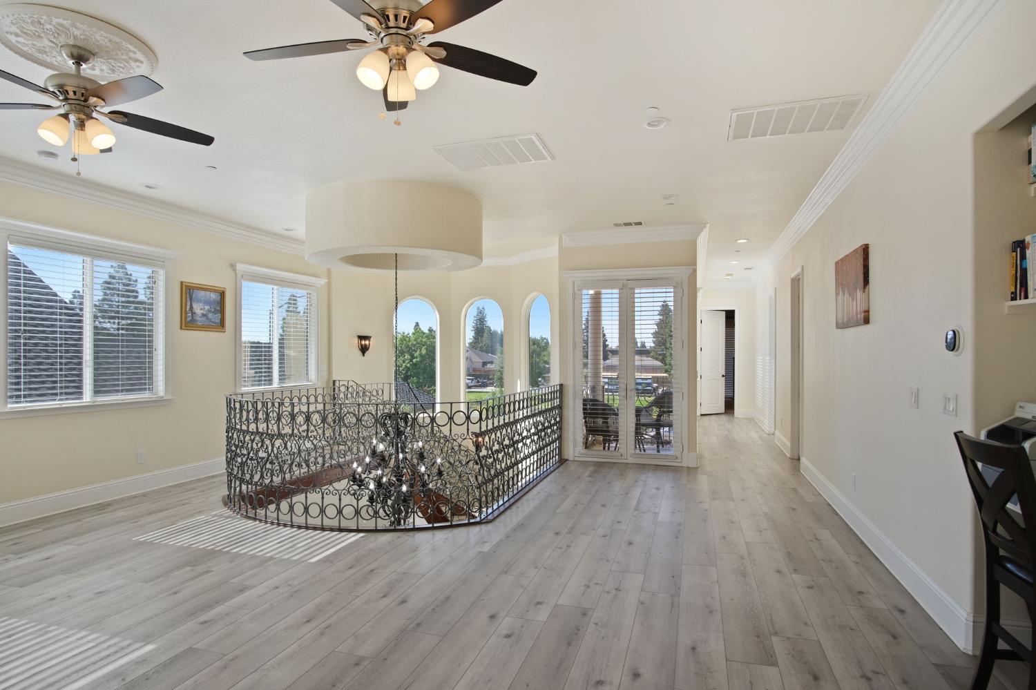 3205 Hillglen Avenue Modesto, CA 95355 - Photo 25 of 45 a living room with furniture and a wooden floor