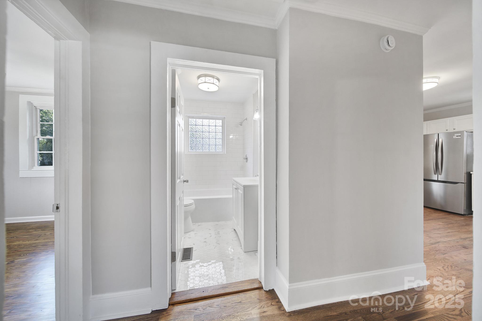 744 Cauthen Street Rock Hill, SC 29730 - Photo 12 of 28 a view of a bathroom from a hallway