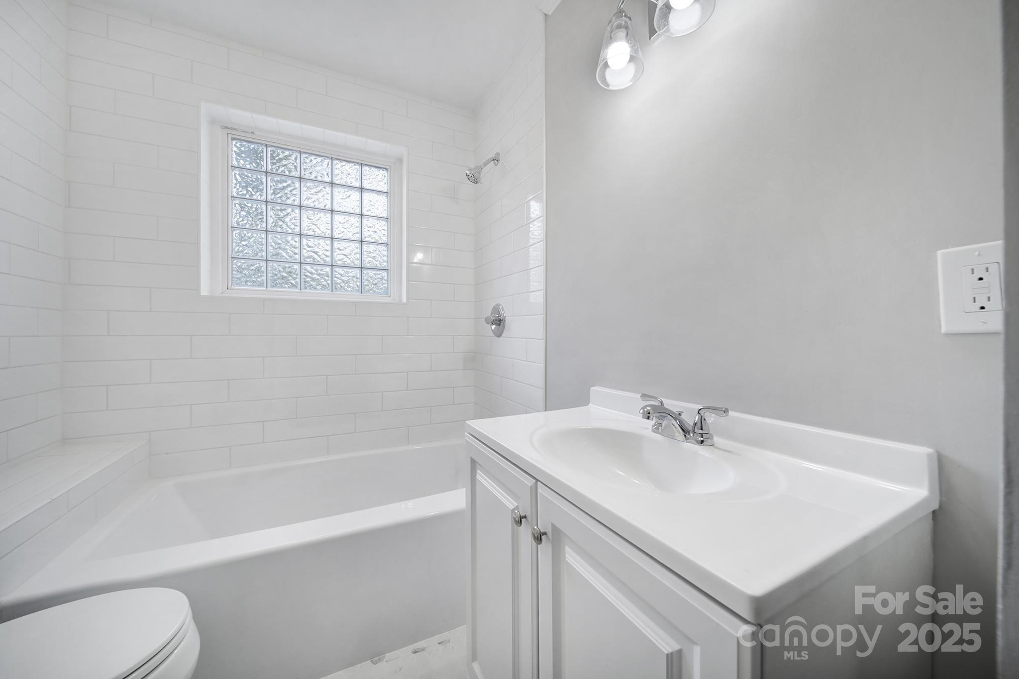 744 Cauthen Street Rock Hill, SC 29730 - Photo 13 of 28 a white bath tub sitting next to a white sink