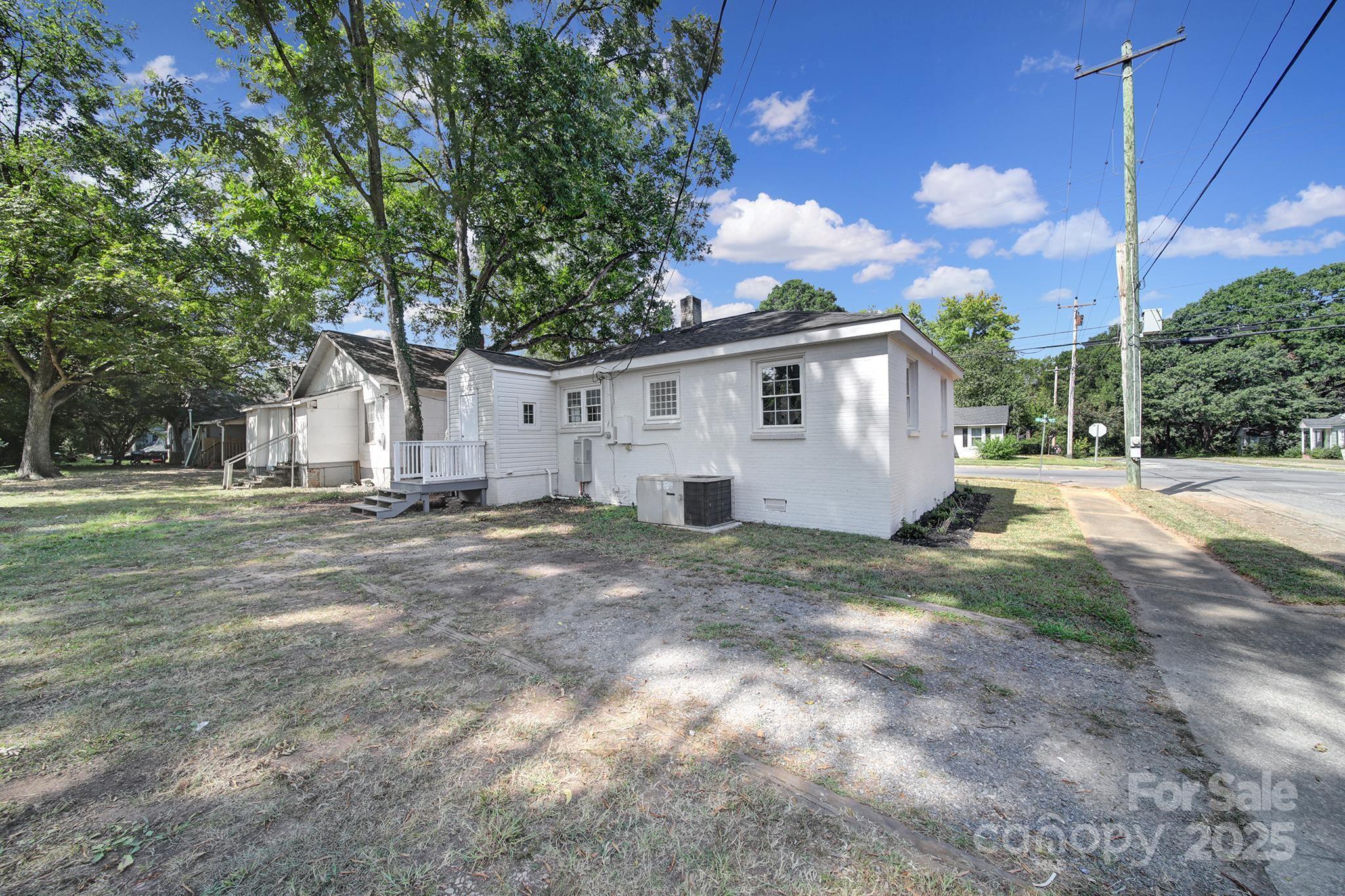744 Cauthen Street Rock Hill, SC 29730 - Photo 25 of 28 a view of a house with backyard and a tree