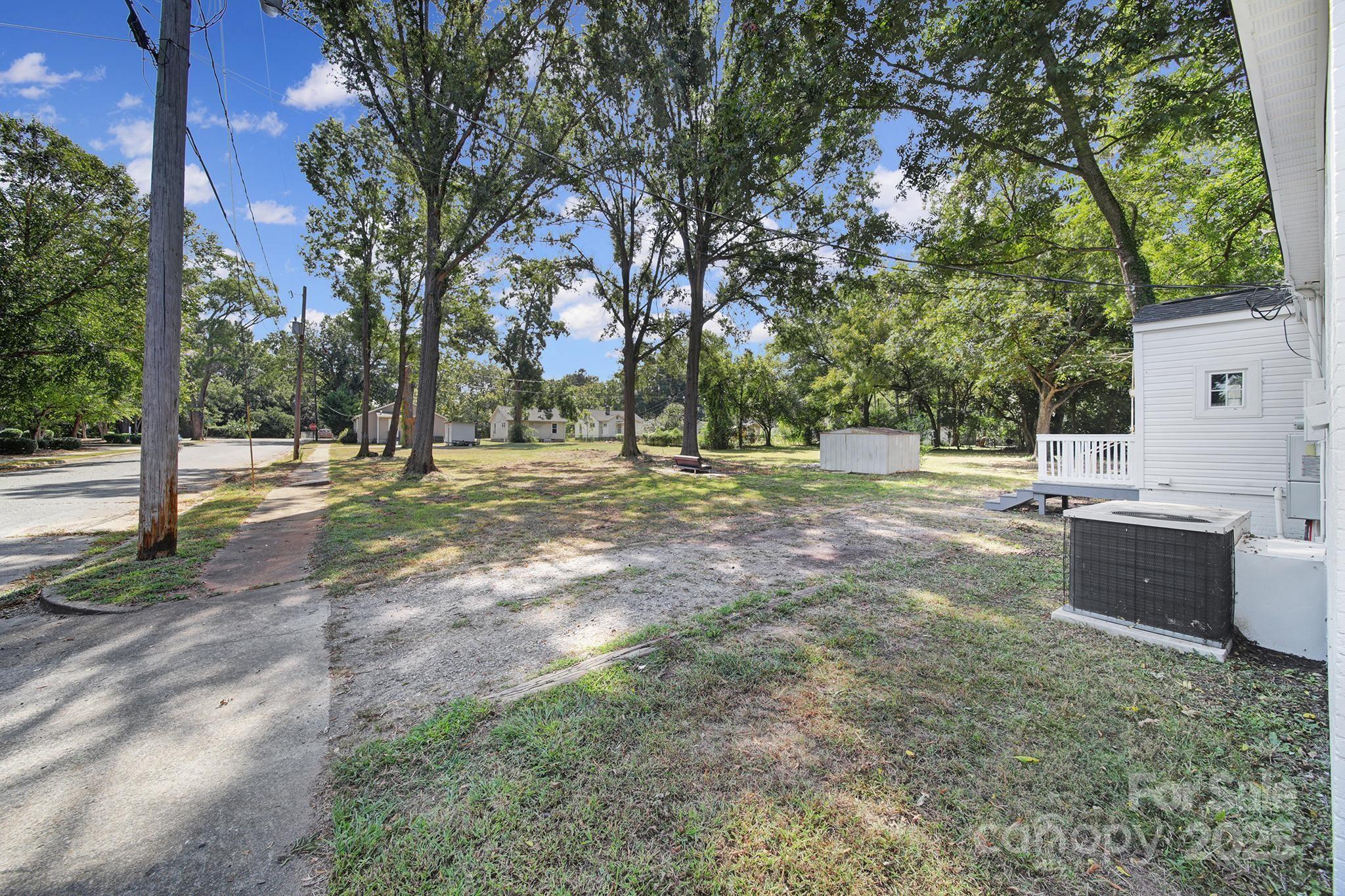 744 Cauthen Street Rock Hill, SC 29730 - Photo 26 of 28 a view of a backyard with large trees