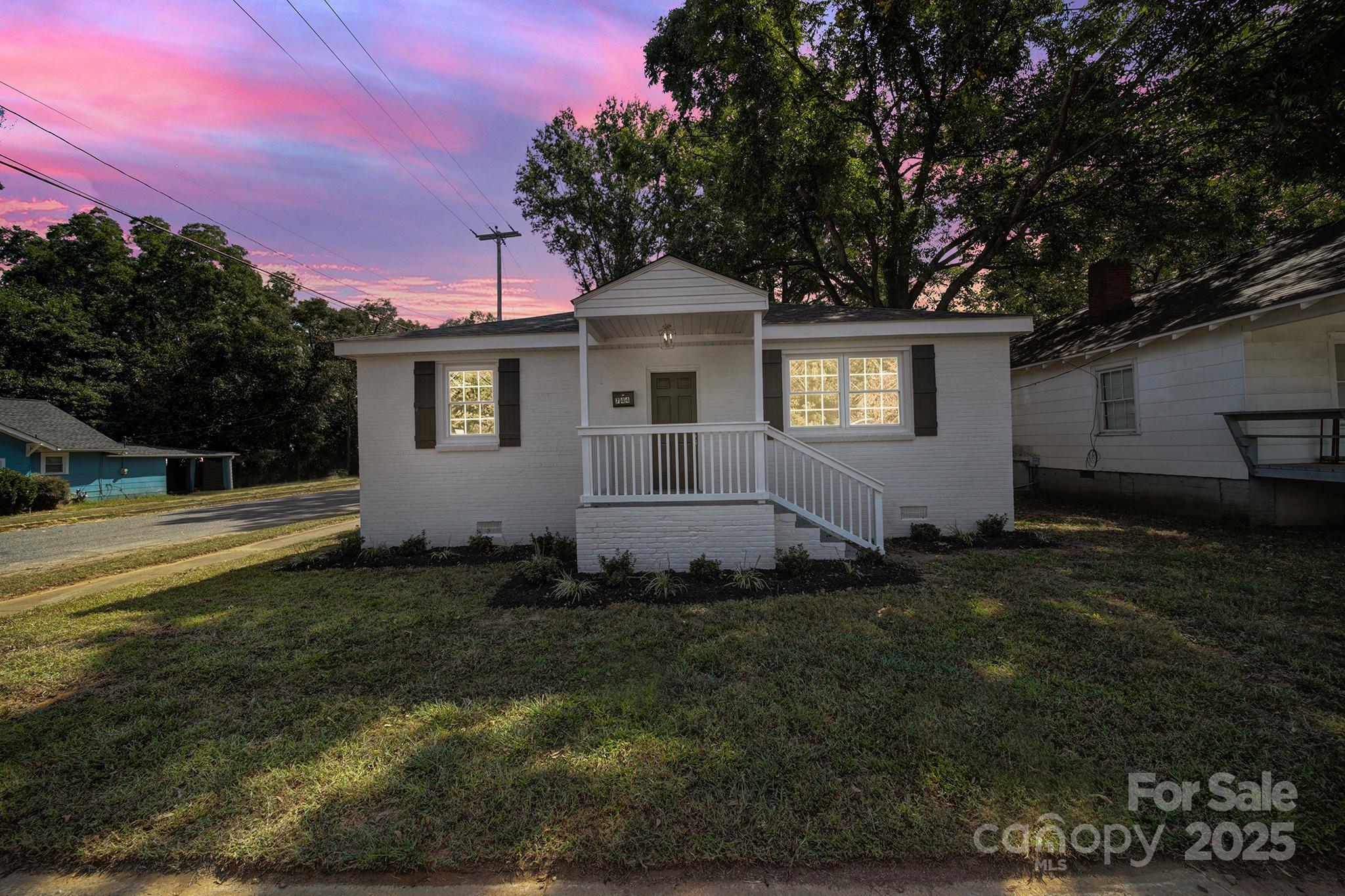 744 Cauthen Street Rock Hill, SC 29730 - Photo 27 of 28 a front view of a house with a garden