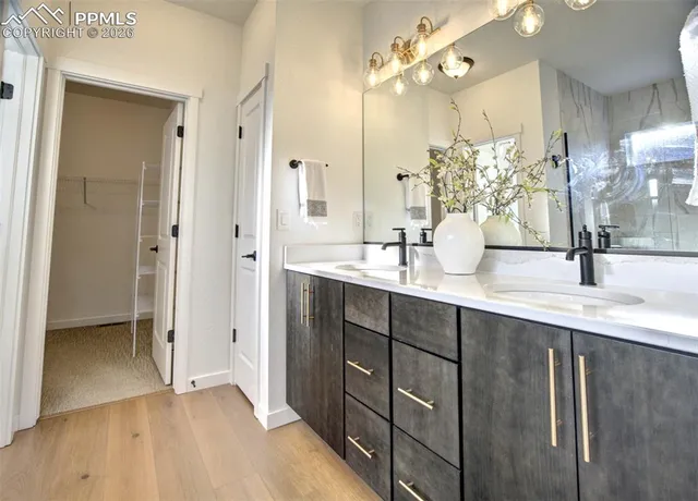 a bathroom with a tub and shower
