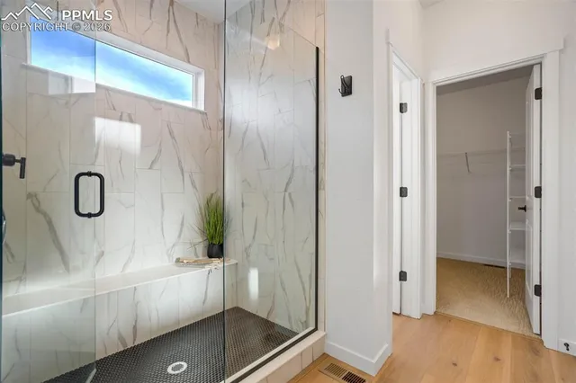 a view of a room with racks on the wall