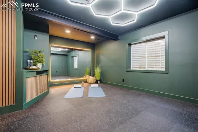 a view of a room with gym equipment