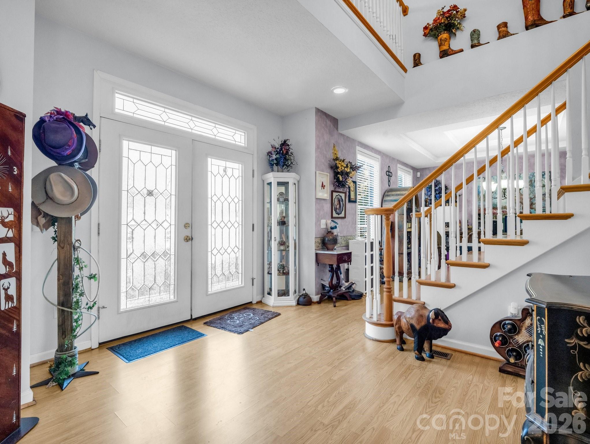 532 Harvey Logan Road Bostic, NC 28018 - Photo 27 of 48 a view of an entryway with wooden floor and windows