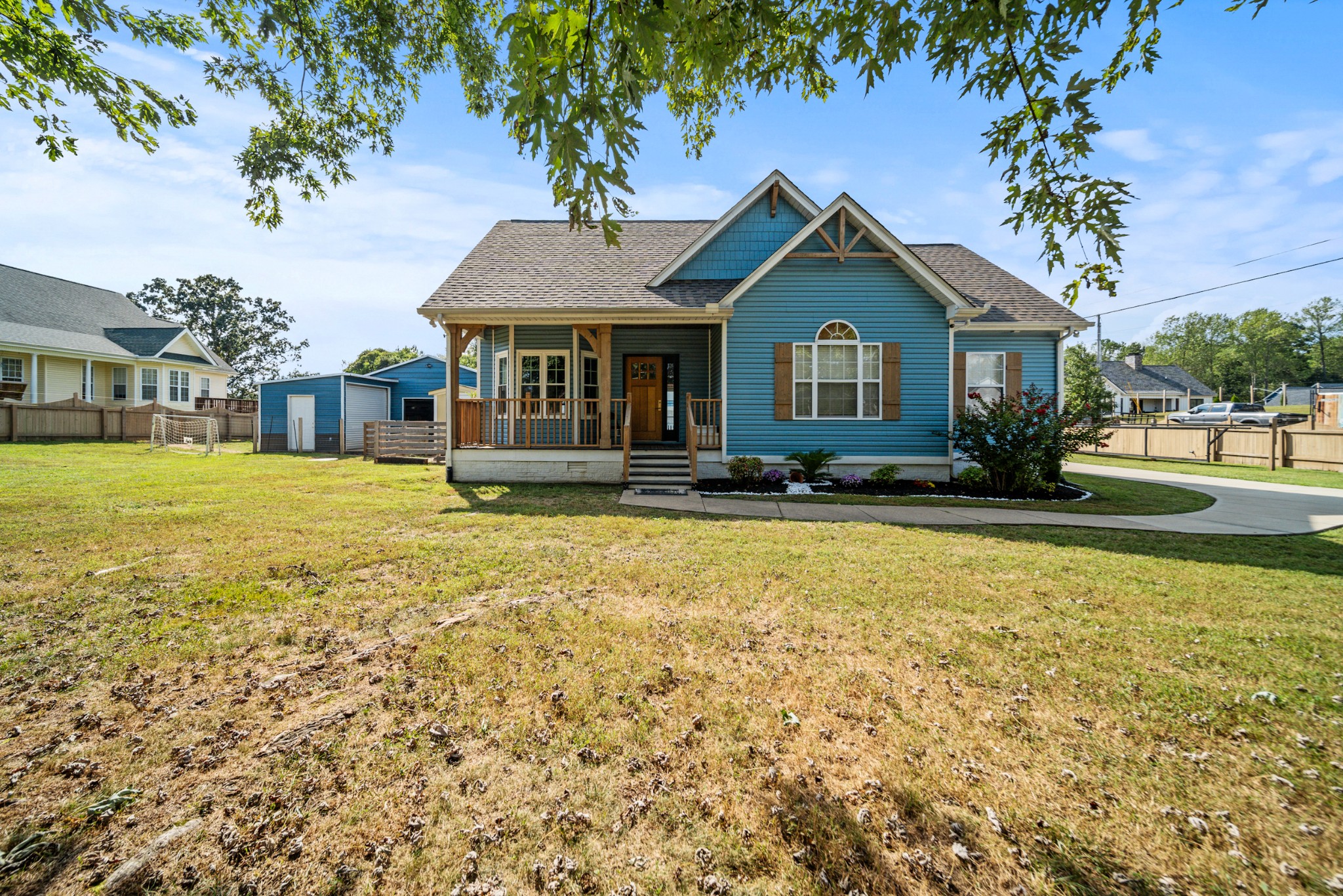 832 Blakemore Road Dickson, TN 37055 - Photo 1 of 42 a front view of a house with garden