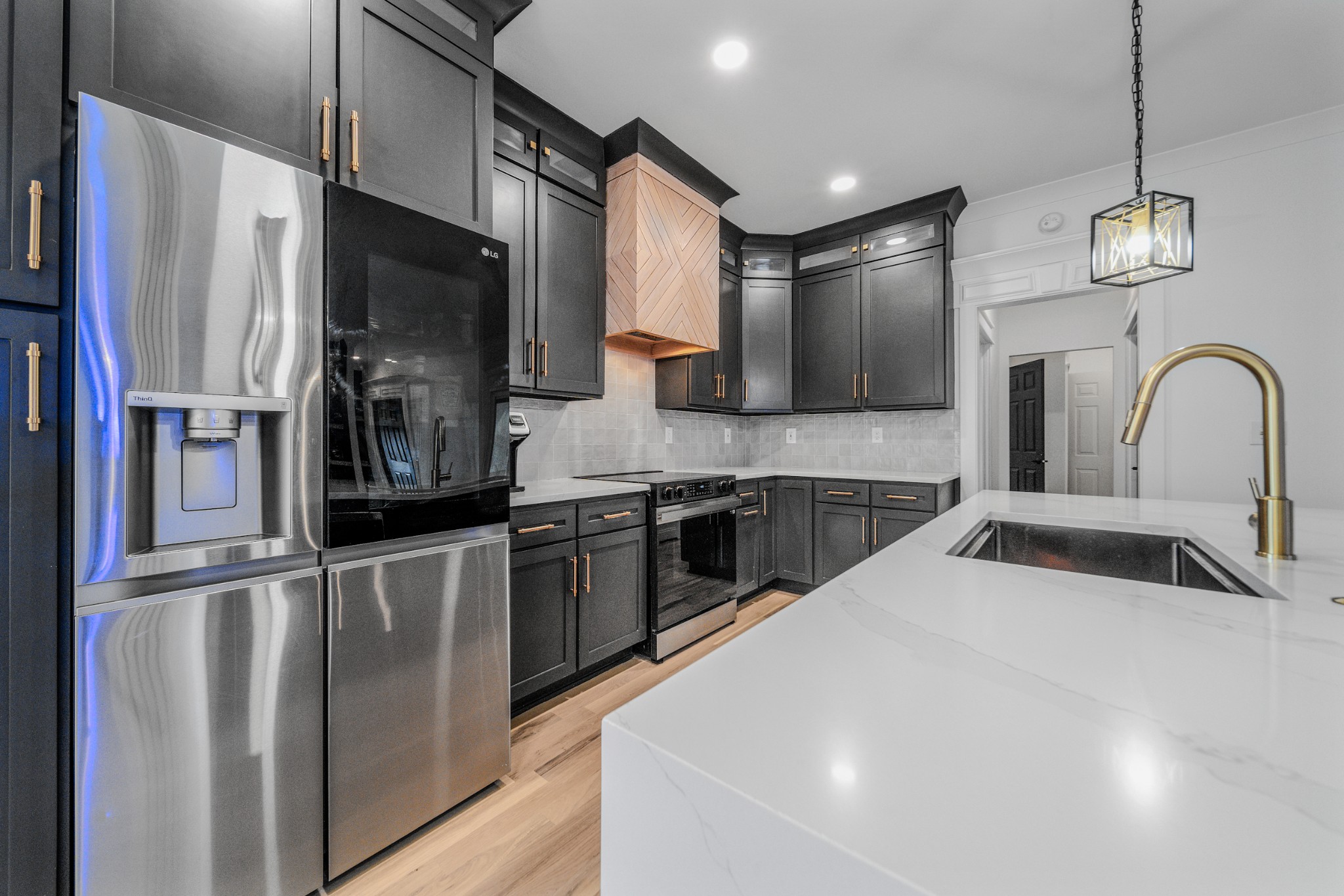 832 Blakemore Road Dickson, TN 37055 - Photo 11 of 42 a kitchen with stainless steel appliances granite countertop a refrigerator a stove a sink and a microwave
