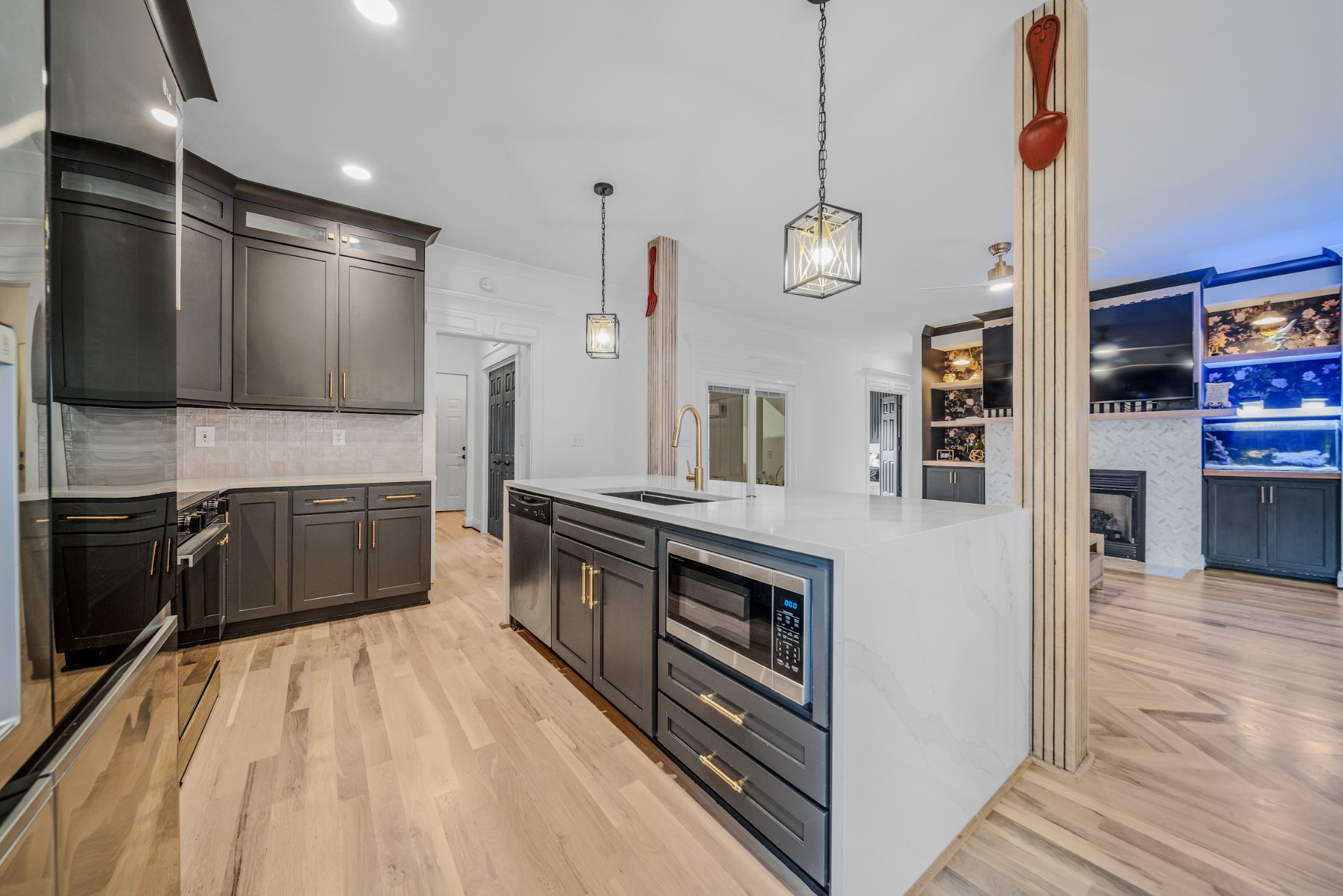 832 Blakemore Road Dickson, TN 37055 - Photo 12 of 42 a kitchen with stainless steel appliances granite countertop a stove a sink and a refrigerator