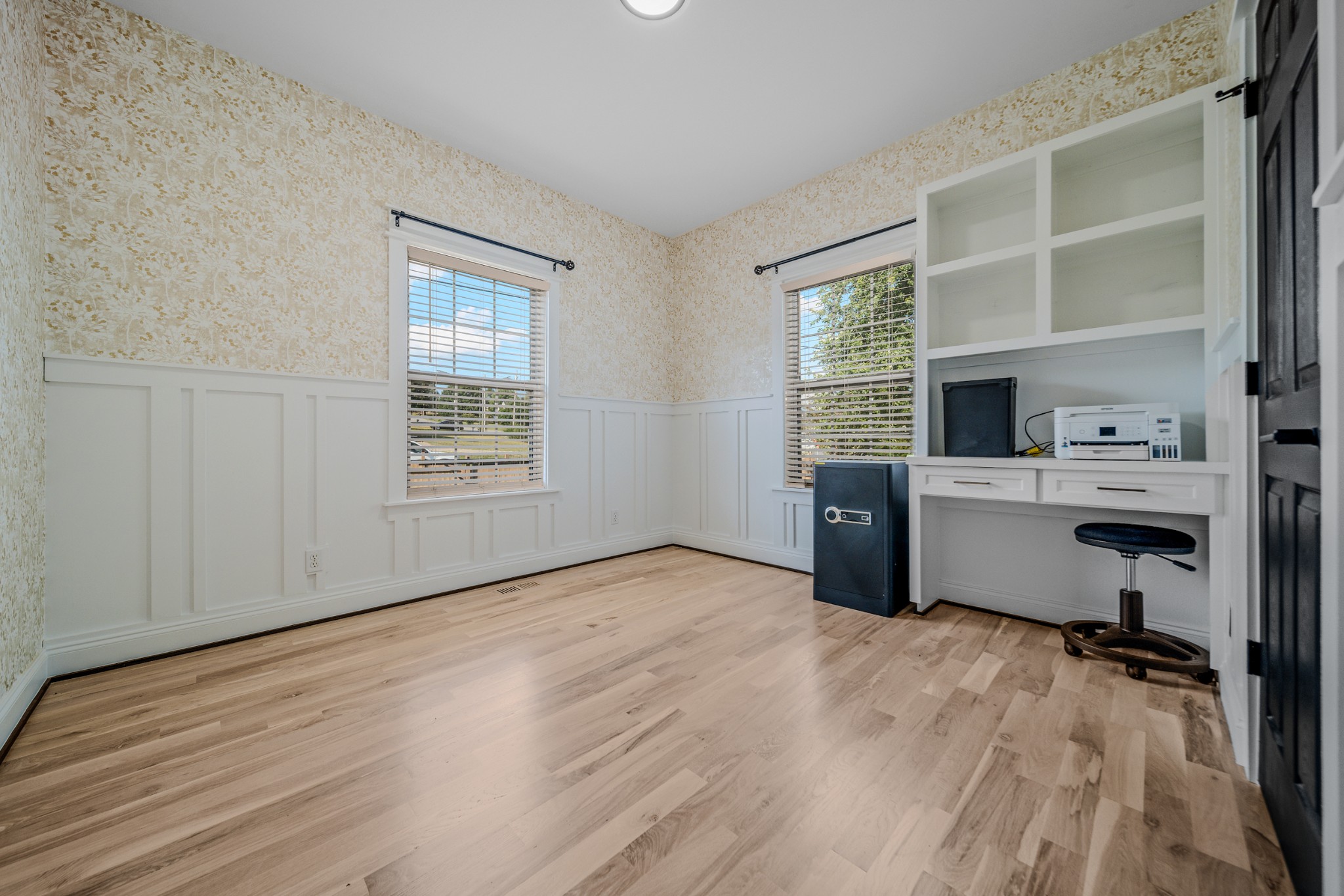 832 Blakemore Road Dickson, TN 37055 - Photo 16 of 42 a room with a wooden floor and windows