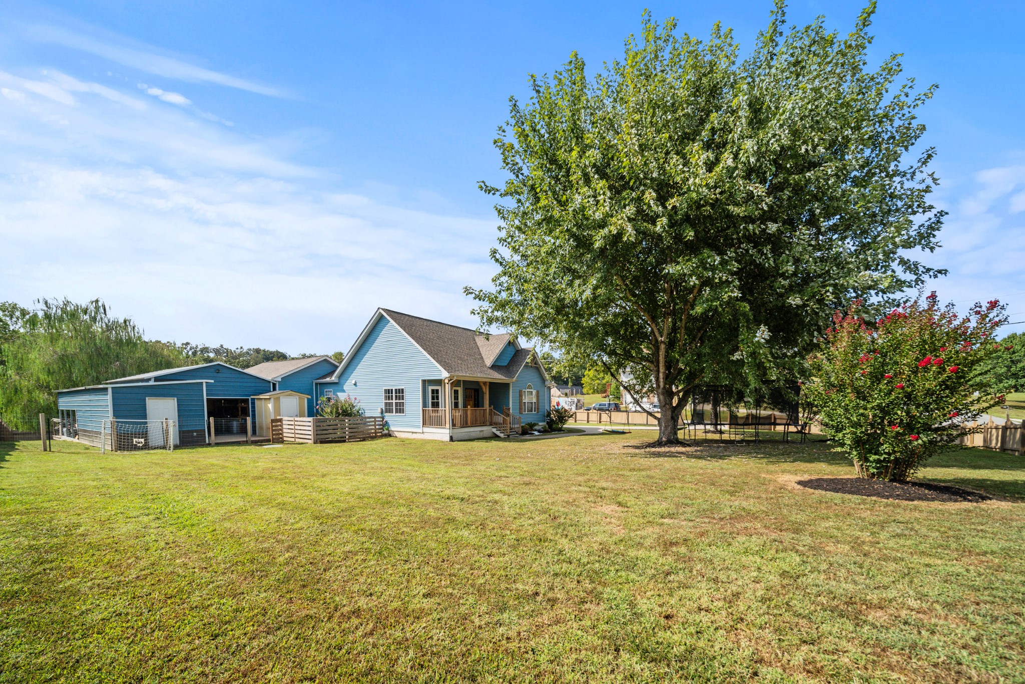 832 Blakemore Road Dickson, TN 37055 - Photo 2 of 42 a front view of house with yard and trees in the background