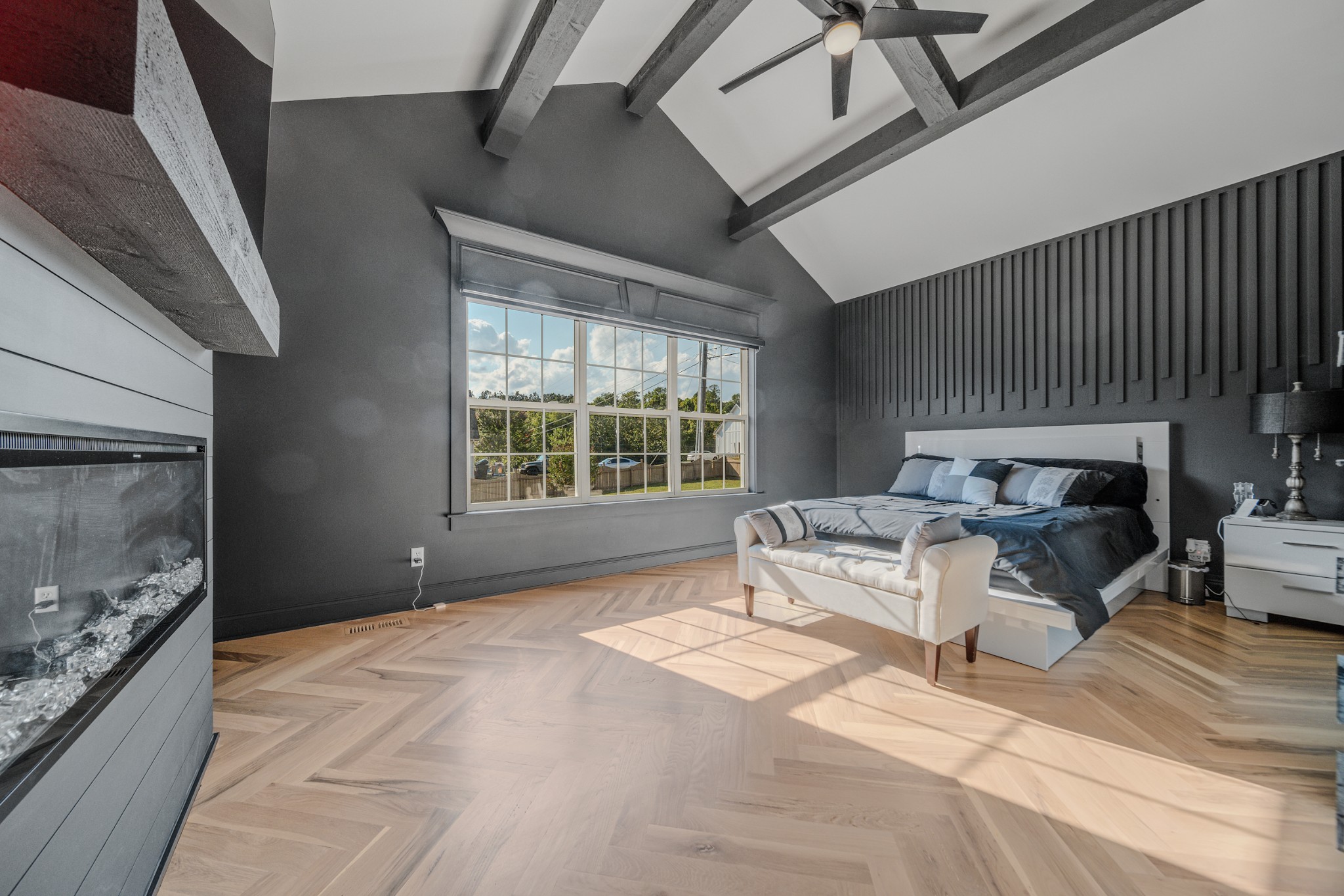 832 Blakemore Road Dickson, TN 37055 - Photo 23 of 42 a spacious bedroom with a large bed and a fireplace
