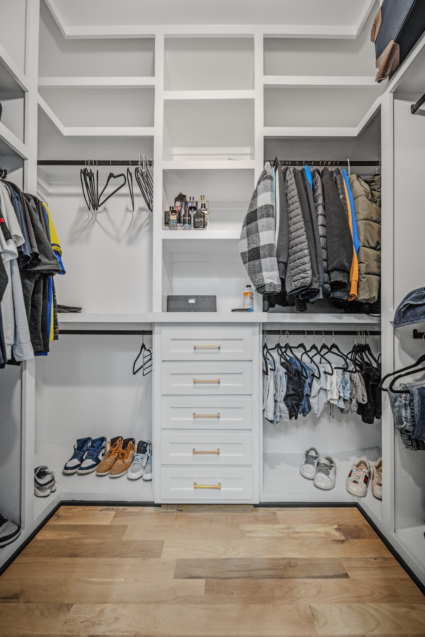 832 Blakemore Road Dickson, TN 37055 - Photo 30 of 42 a view of walk in closet with clothes and shoes