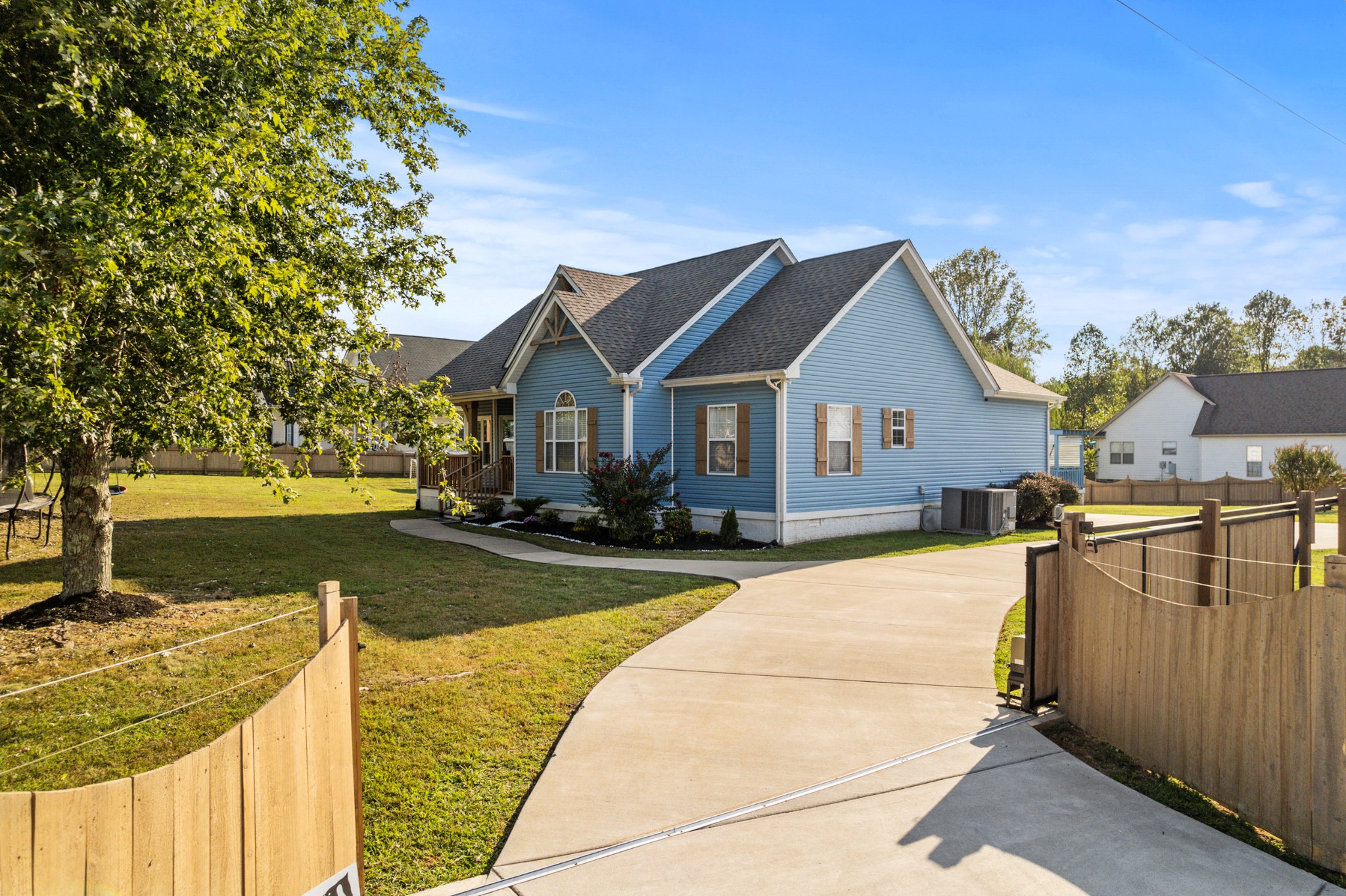 832 Blakemore Road Dickson, TN 37055 - Photo 3 of 42 a front view of a house with a yard