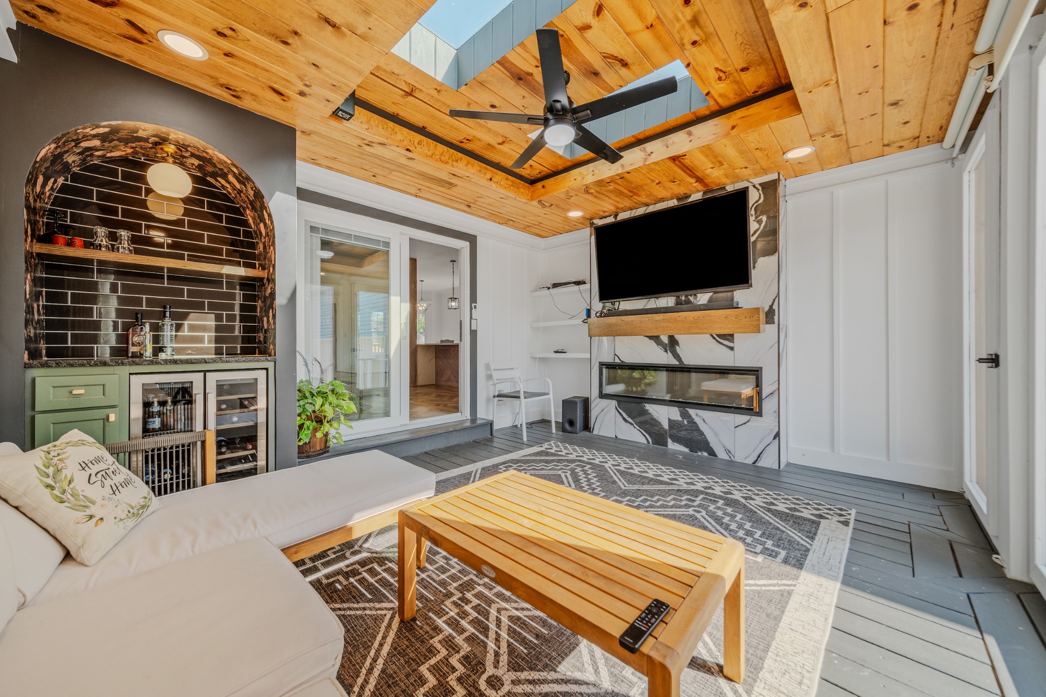 832 Blakemore Road Dickson, TN 37055 - Photo 32 of 42 a outdoor living space with furniture and a flat screen tv