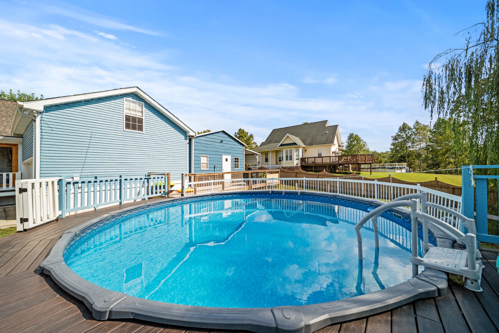 832 Blakemore Road Dickson, TN 37055 - Photo 34 of 42 a view of a house with swimming pool