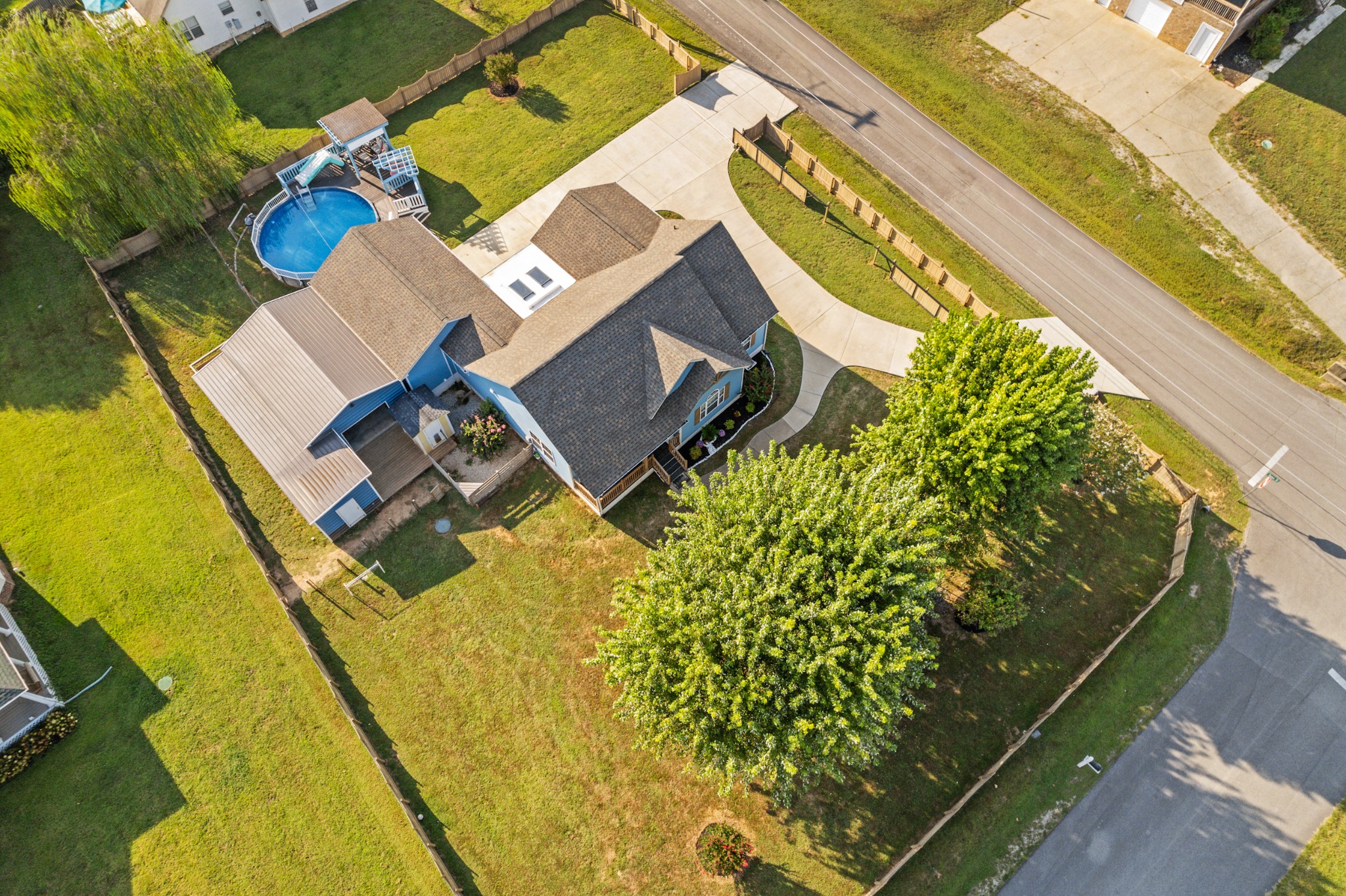 832 Blakemore Road Dickson, TN 37055 - Photo 42 of 42 an aerial view of a house with swimming pool