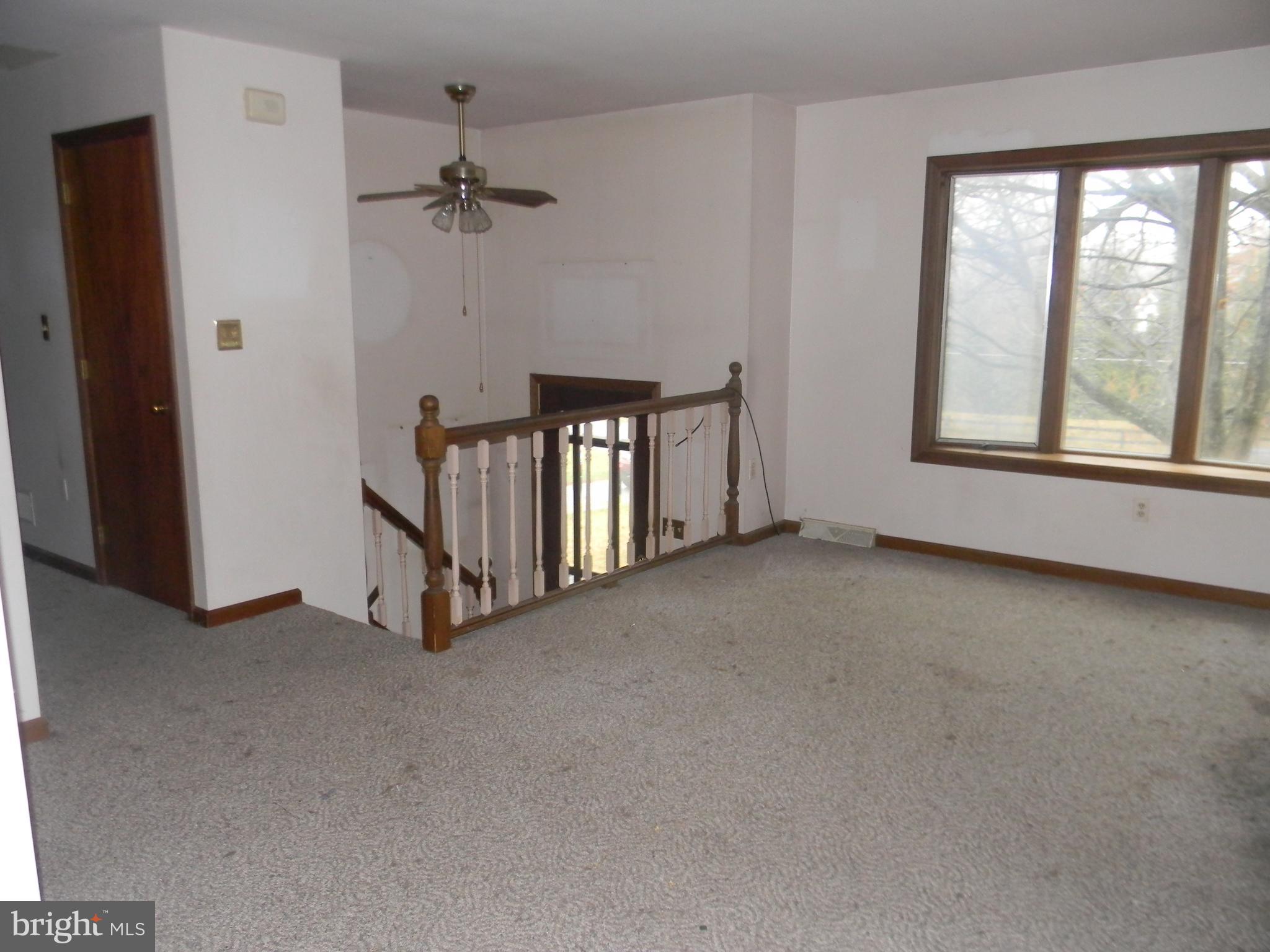 14902 Falls Road Reisterstown, MD 21136 - Photo 3 of 34 FRONT DOOR ENTRY TO LIVING ROOM