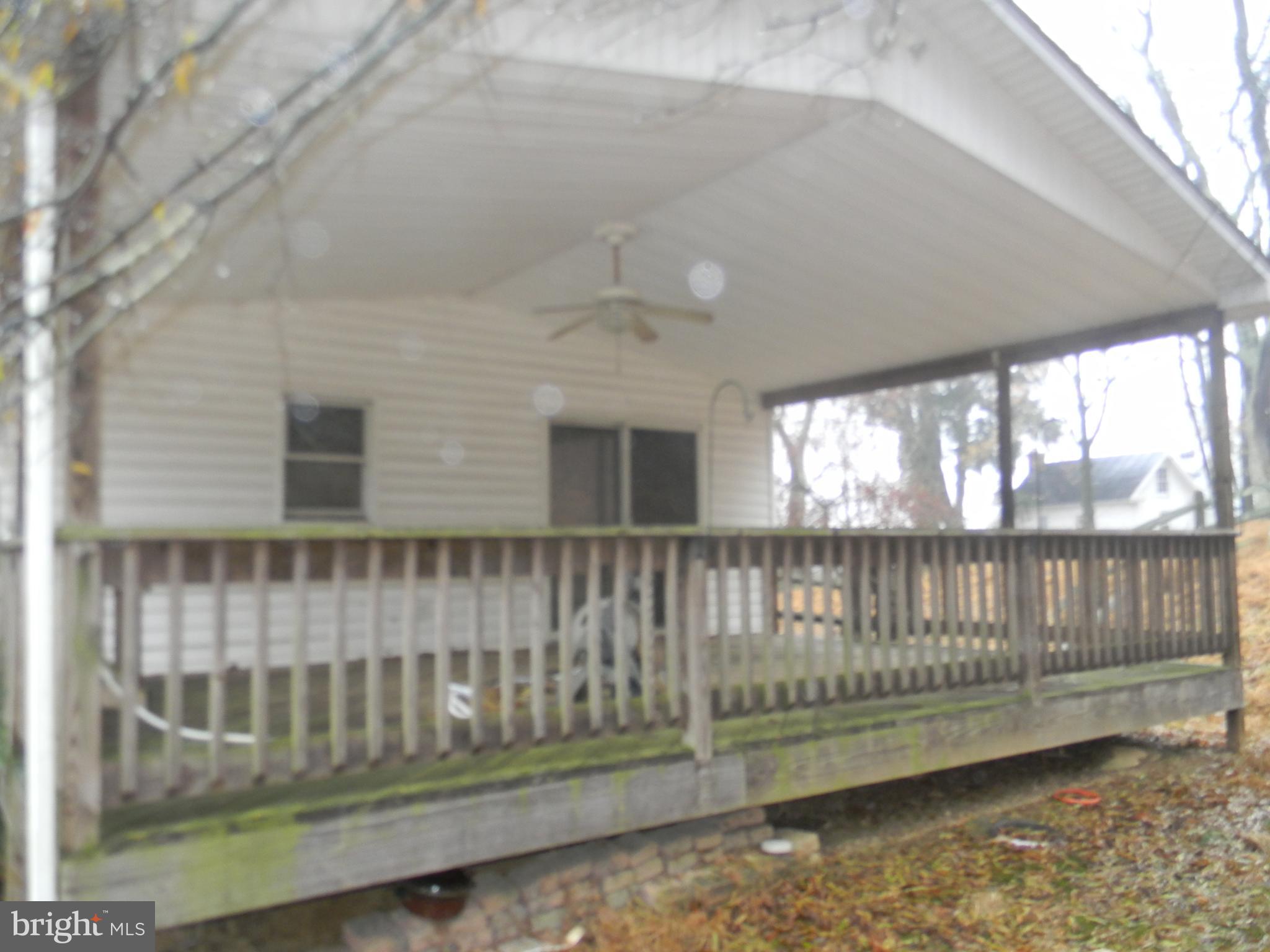 14902 Falls Road Reisterstown, MD 21136 - Photo 32 of 34 COVERED DECK OFF KITCHEN