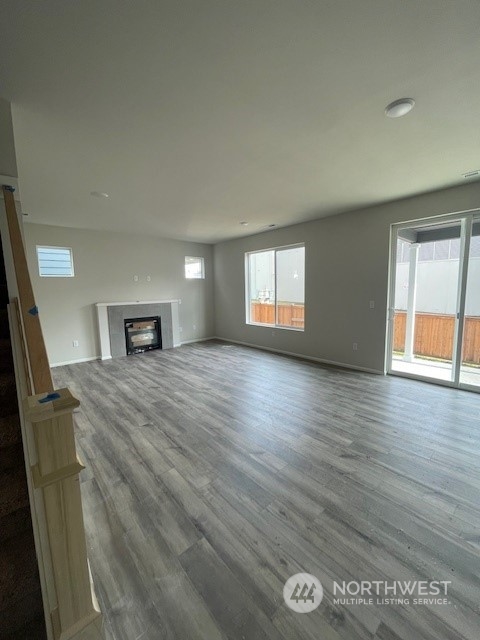 2812 Laurel Loop Milton, WA 98354 - Photo 3 of 11 a spacious bedroom with a bed and a tv on table