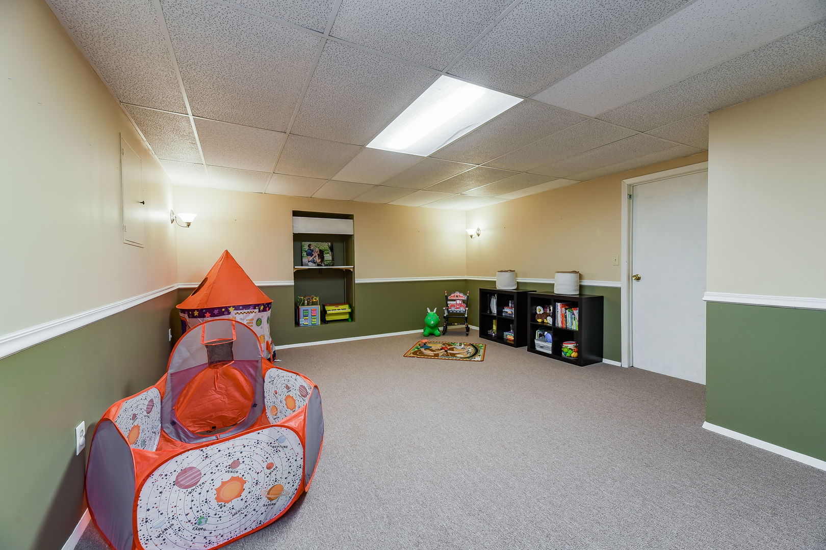 N020 Pleasant Hill Road Wheaton, IL 60187 - Photo 12 of 16 a view of a room with furniture and toys
