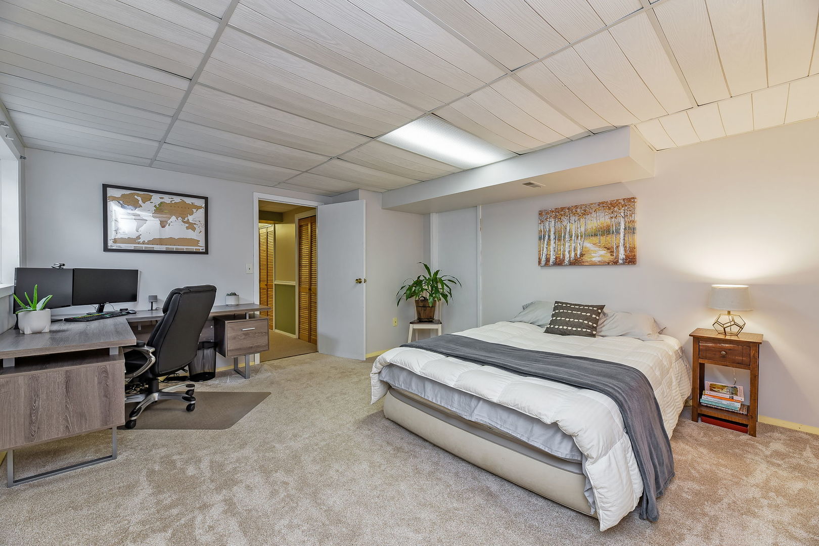 N020 Pleasant Hill Road Wheaton, IL 60187 - Photo 14 of 16 a bedroom with a bed a desk and chair