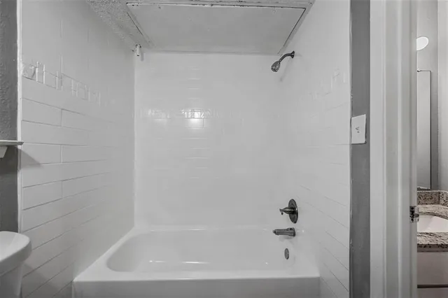 a bathroom with a bathtub