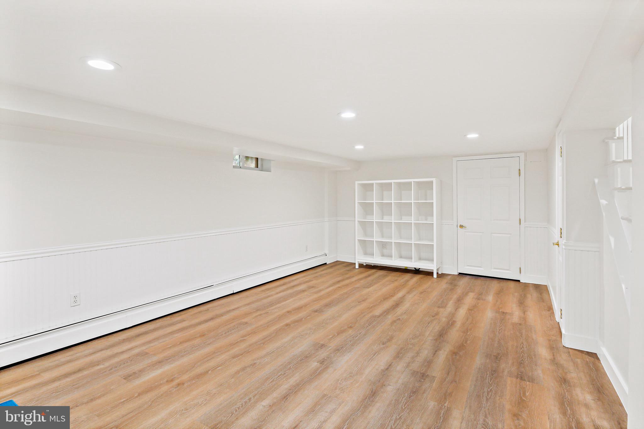 5514 Kemper Road Baltimore, MD 21210 - Photo 35 of 45 L-Shaped LL with Luxury Vinyl Plank Floors