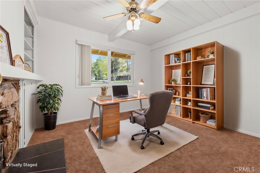 5593 Malvern Way Riverside, CA 92506 - Photo 18 of 54 a workspace with furniture and a window