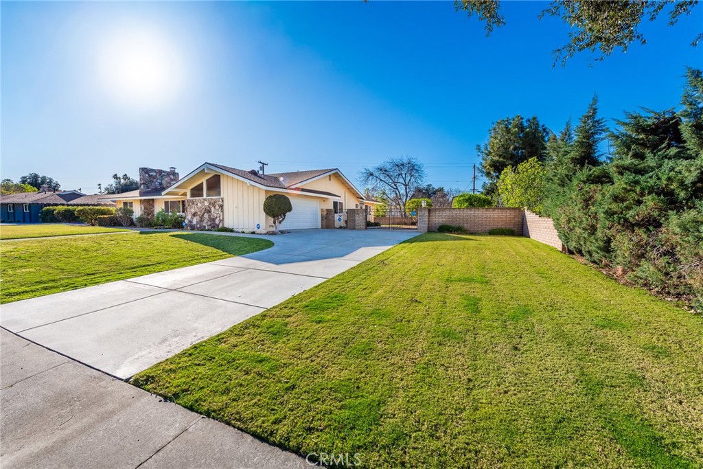 5593 Malvern Way Riverside, CA 92506 - Photo 35 of 54 a view of a big yard with potted plants