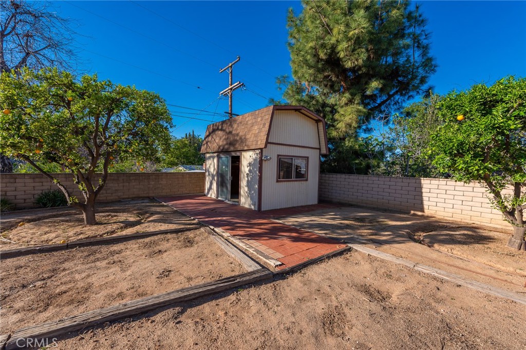 5593 Malvern Way Riverside, CA 92506 - Photo 41 of 54 a front view of a house with trees