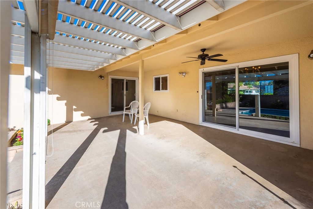 5593 Malvern Way Riverside, CA 92506 - Photo 42 of 54 a view of a patio with table and chairs