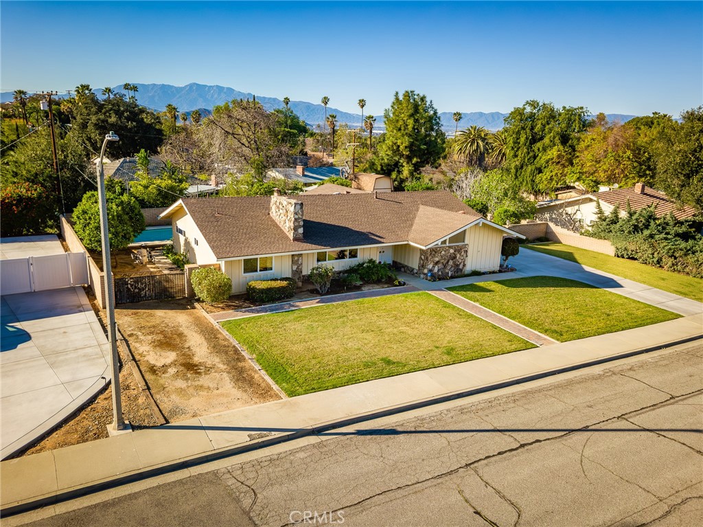 5593 Malvern Way Riverside, CA 92506 - Photo 51 of 54 a view of a swimming pool with an ocean view