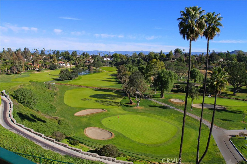 5593 Malvern Way Riverside, CA 92506 - Photo 53 of 54 a view of a golf course with a lake