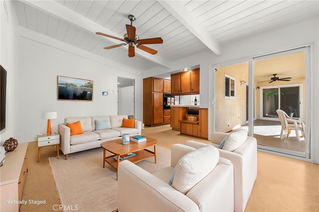 5593 Malvern Way Riverside, CA 92506 - Photo 8 of 54 a living room with furniture and a large window