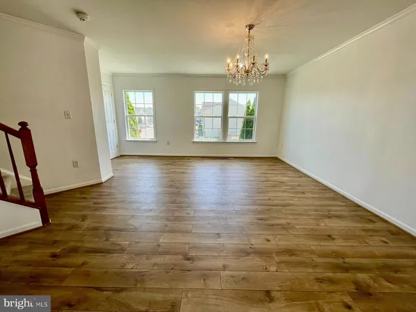 a view of livingroom with hardwood floor and window