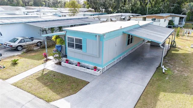 a view of a dinning table and chairs in the patio