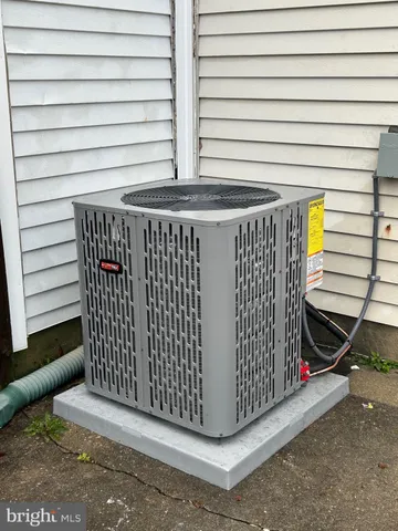 a view of a backyard with a chair