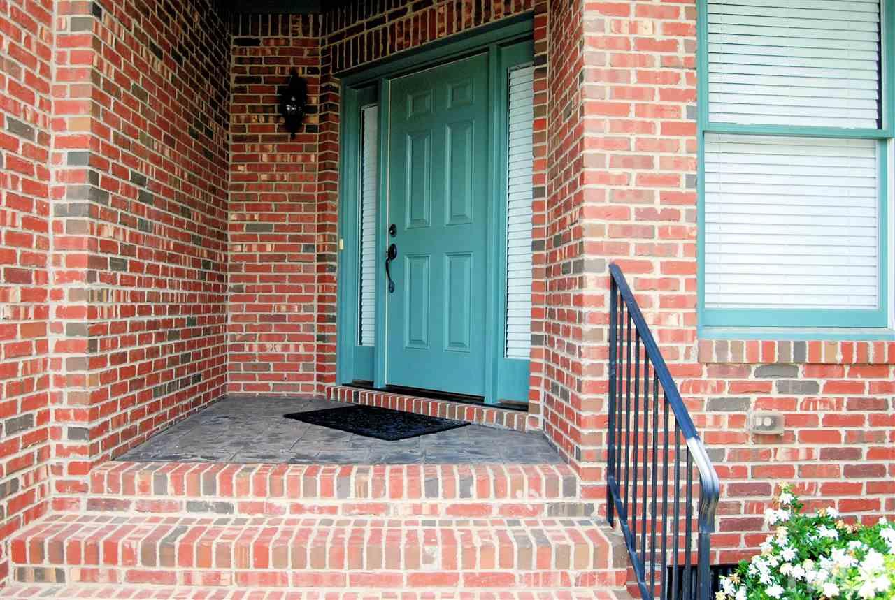 8012 Lloyd Allyns Way Raleigh, NC 27615 - Photo 2 of 25 Entrance area has a small Garden area and Covered Front Porch.