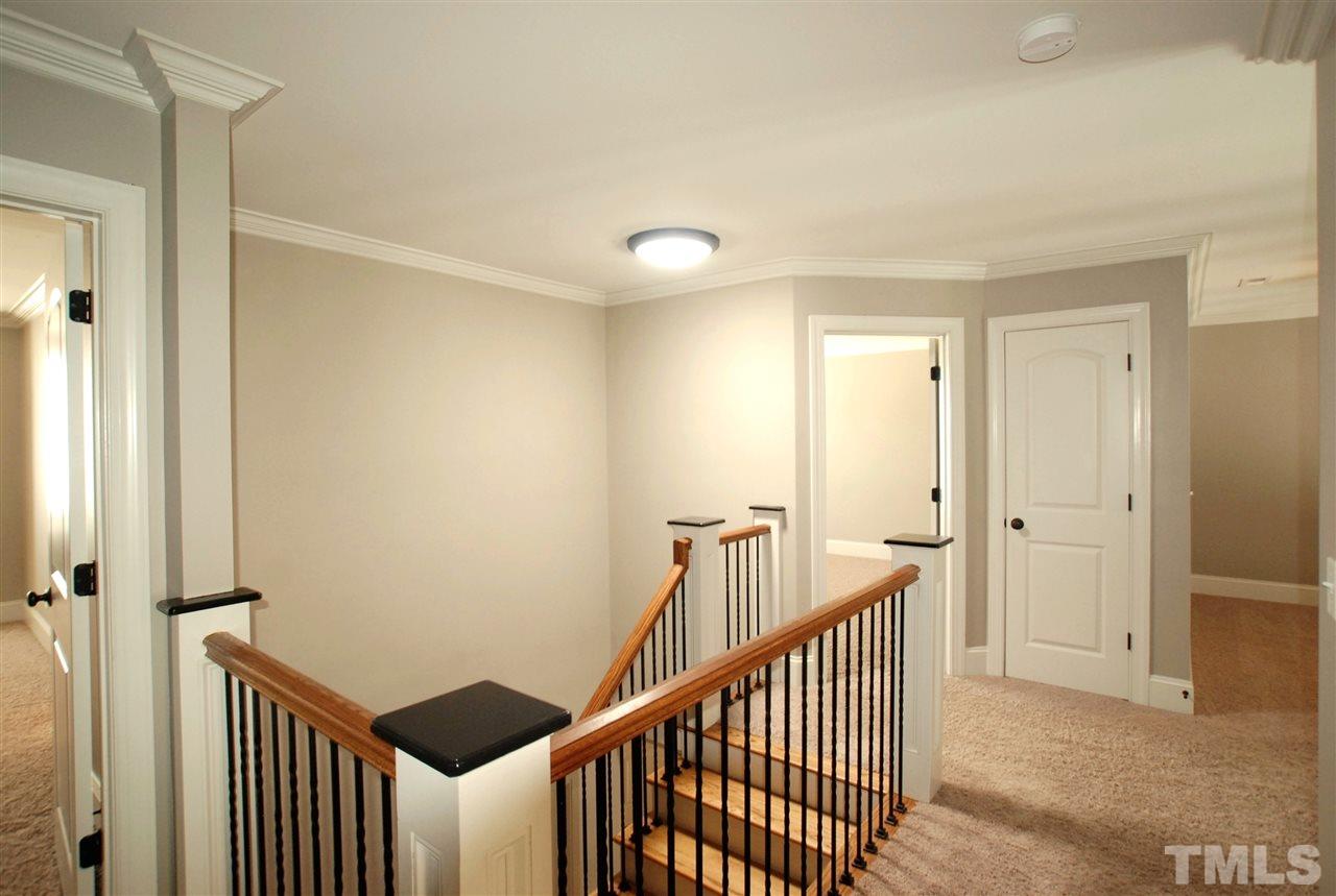 8012 Lloyd Allyns Way Raleigh, NC 27615 - Photo 13 of 25 The Solar Tube Lighting provides lots of natural light during the day.