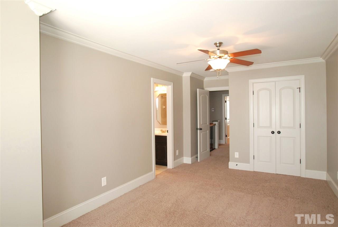 8012 Lloyd Allyns Way Raleigh, NC 27615 - Photo 19 of 25 All Bedrooms have Ceiling Fans & Closets with Built-ins.