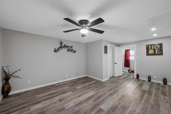 a kitchen with a counter space a sink appliances and a window