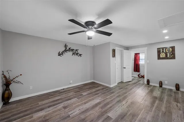 a kitchen with a counter space a sink appliances and a window