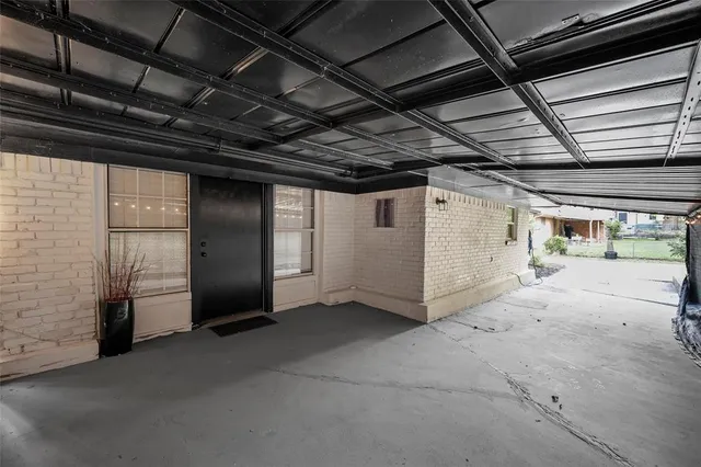 a view of a park with large trees