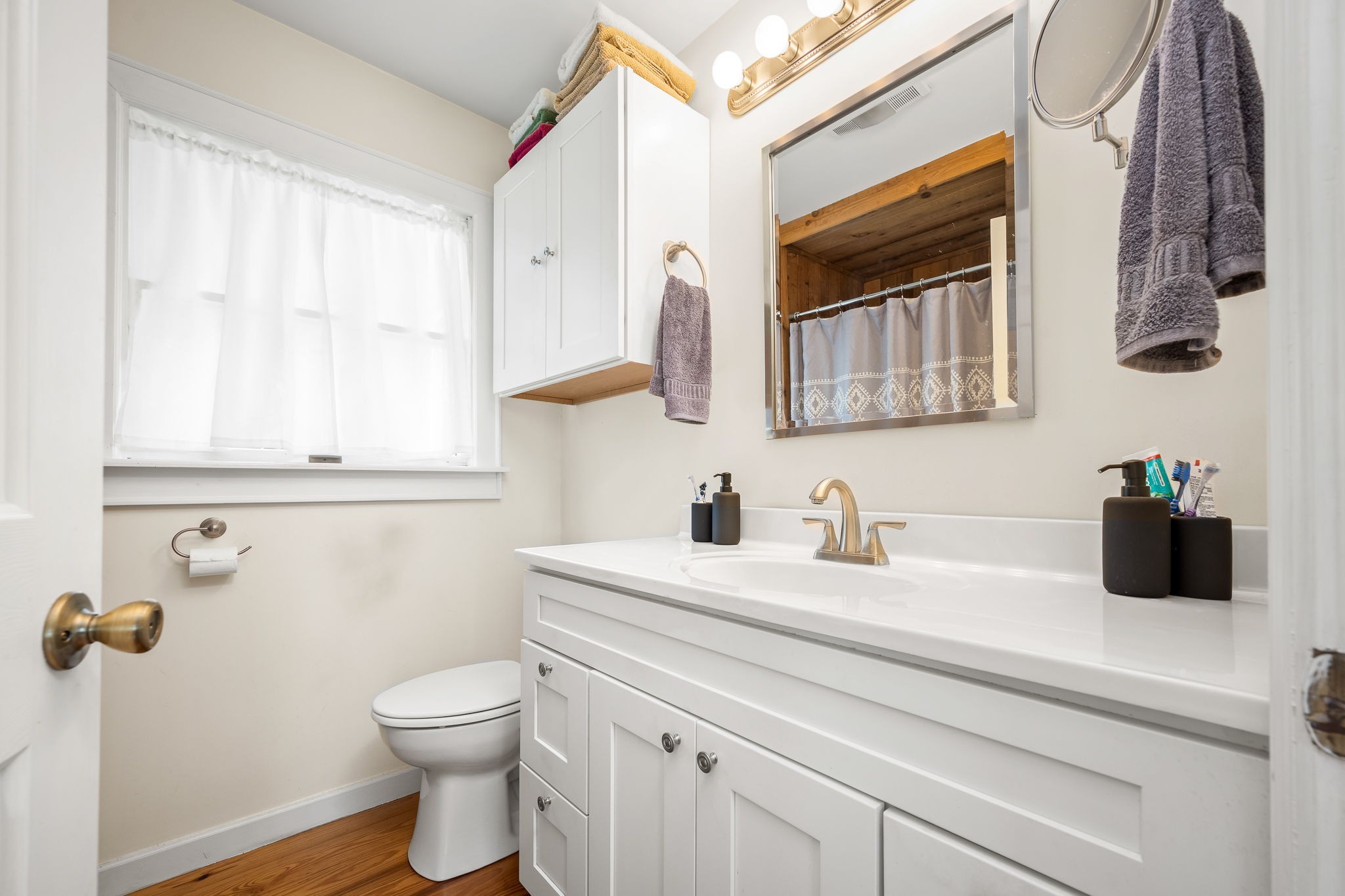 540 Powell Hollow Road Tullahoma, TN 37388 - Photo 31 of 99 a bathroom with a granite countertop sink toilet and mirror