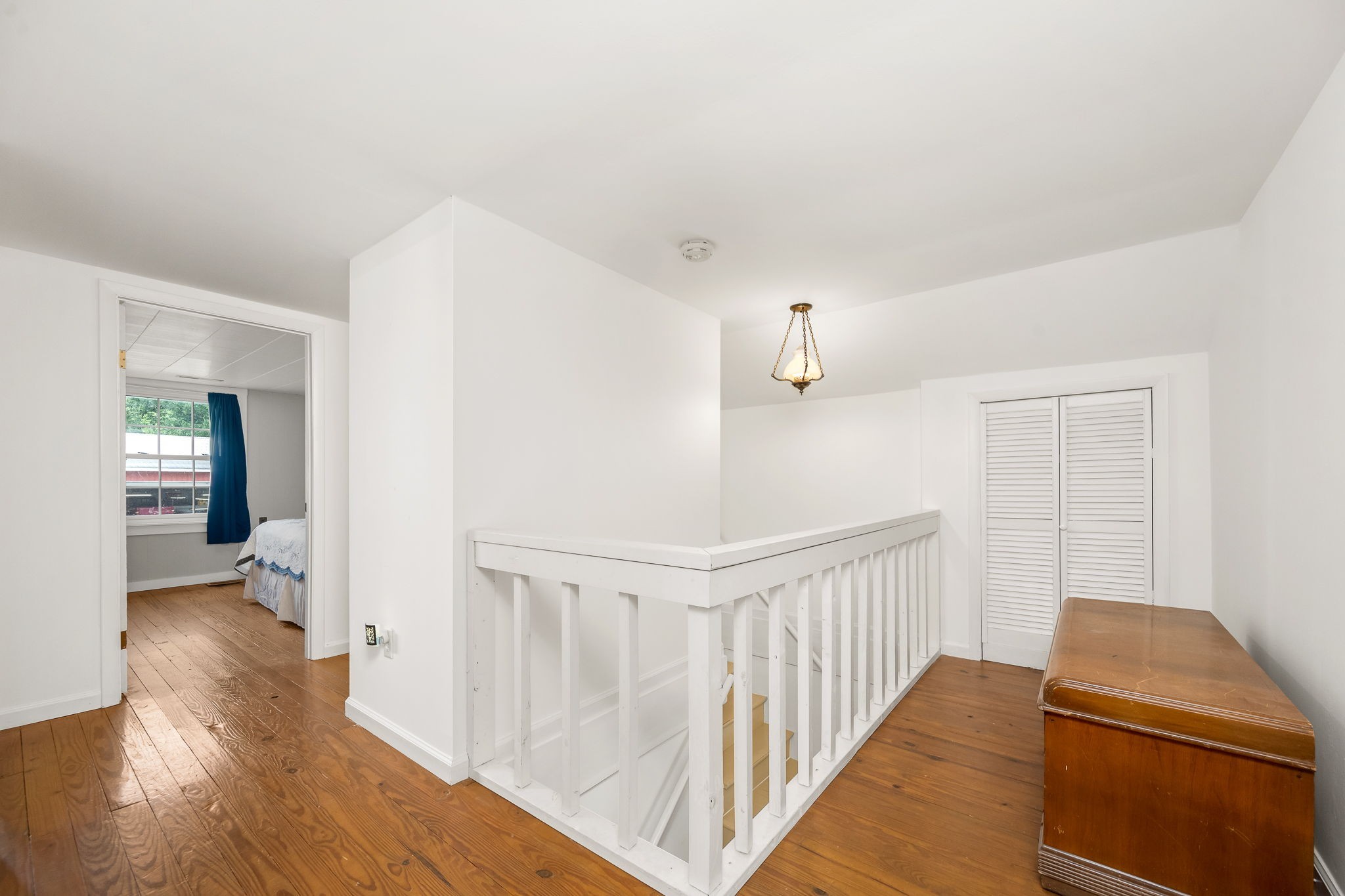 540 Powell Hollow Road Tullahoma, TN 37388 - Photo 39 of 99 a view of a hallway with wooden floor