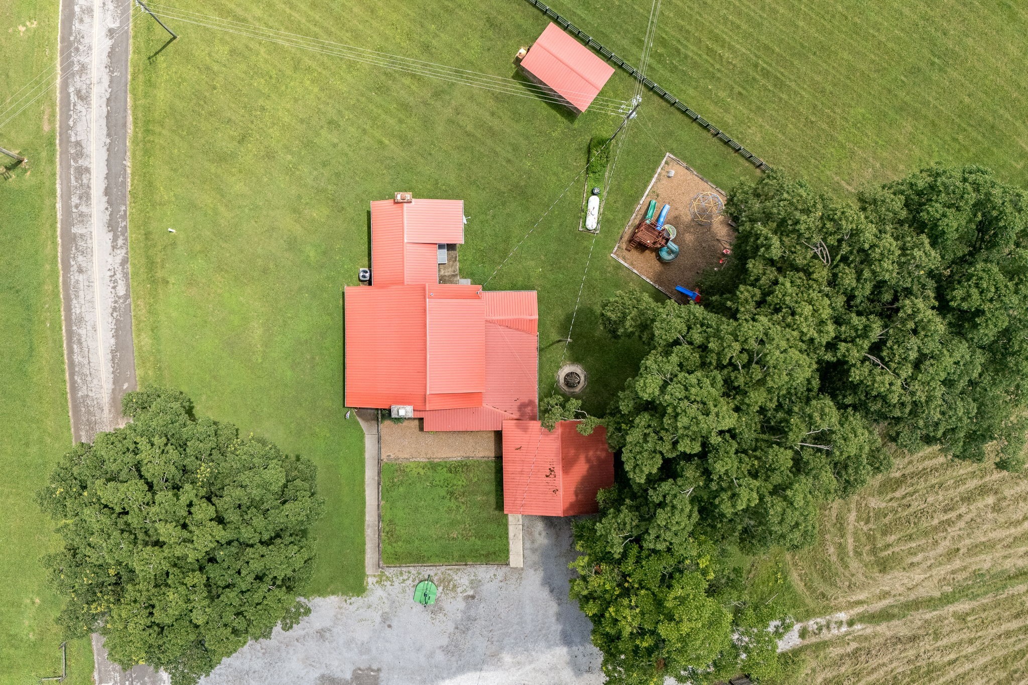 540 Powell Hollow Road Tullahoma, TN 37388 - Photo 63 of 99 an aerial view of a house with a yard and a large tree