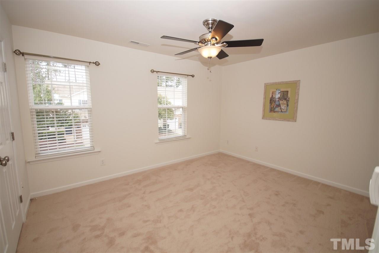 8235 Belneath Court Raleigh, NC 27613 - Photo 14 of 17 a view of an empty room with a window