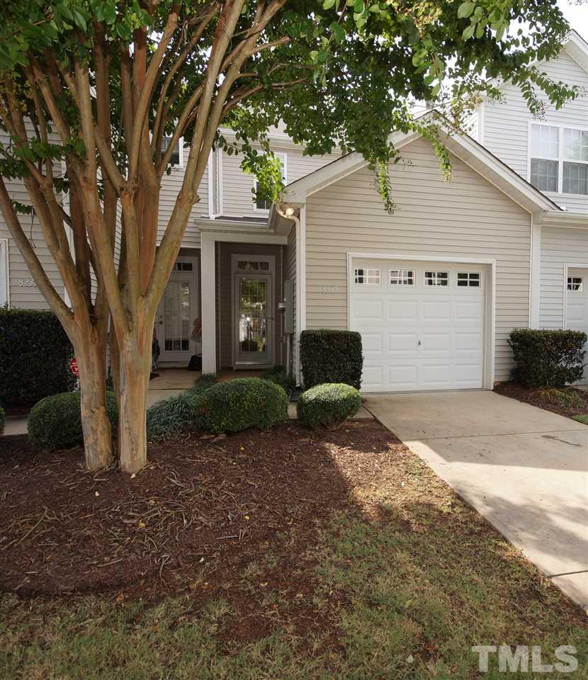 8235 Belneath Court Raleigh, NC 27613 - Photo 17 of 17 a view of a house with a yard