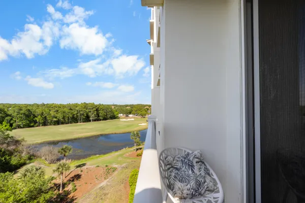 a view of balcony with furniture